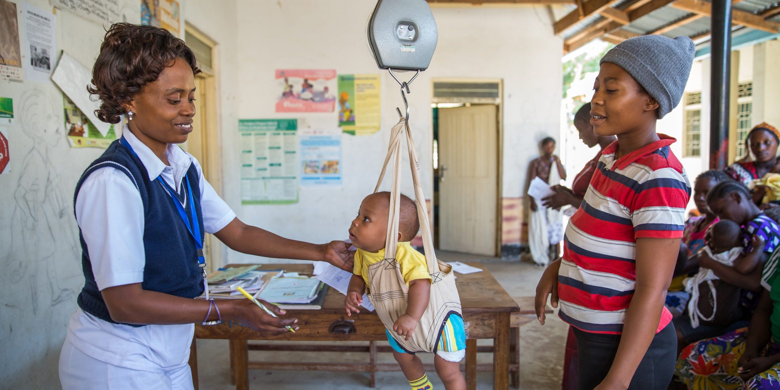 Nurse, Mary T. Mwacha (37 years old) runs the under fives clinic at the hospital where she works. She measures the growth of children in her care, administers vacinations and helps advise mothers on the health of their children. Legacy