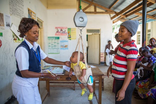 Nurse, Mary T. Mwacha (37 years old) runs the under fives clinic at the hospital where she works. She measures the growth of children in her care, administers vacinations and helps advise mothers on the health of their children. Legacy